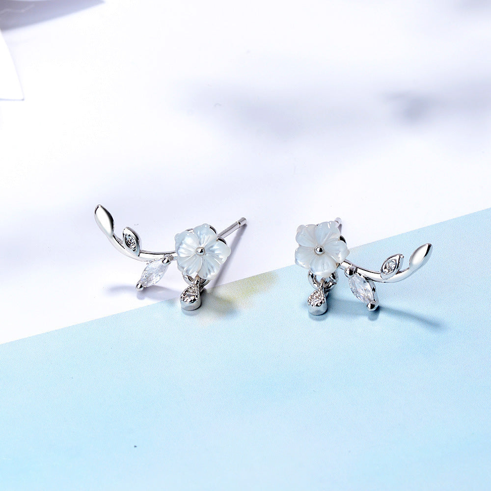 Hand carved flower earrings