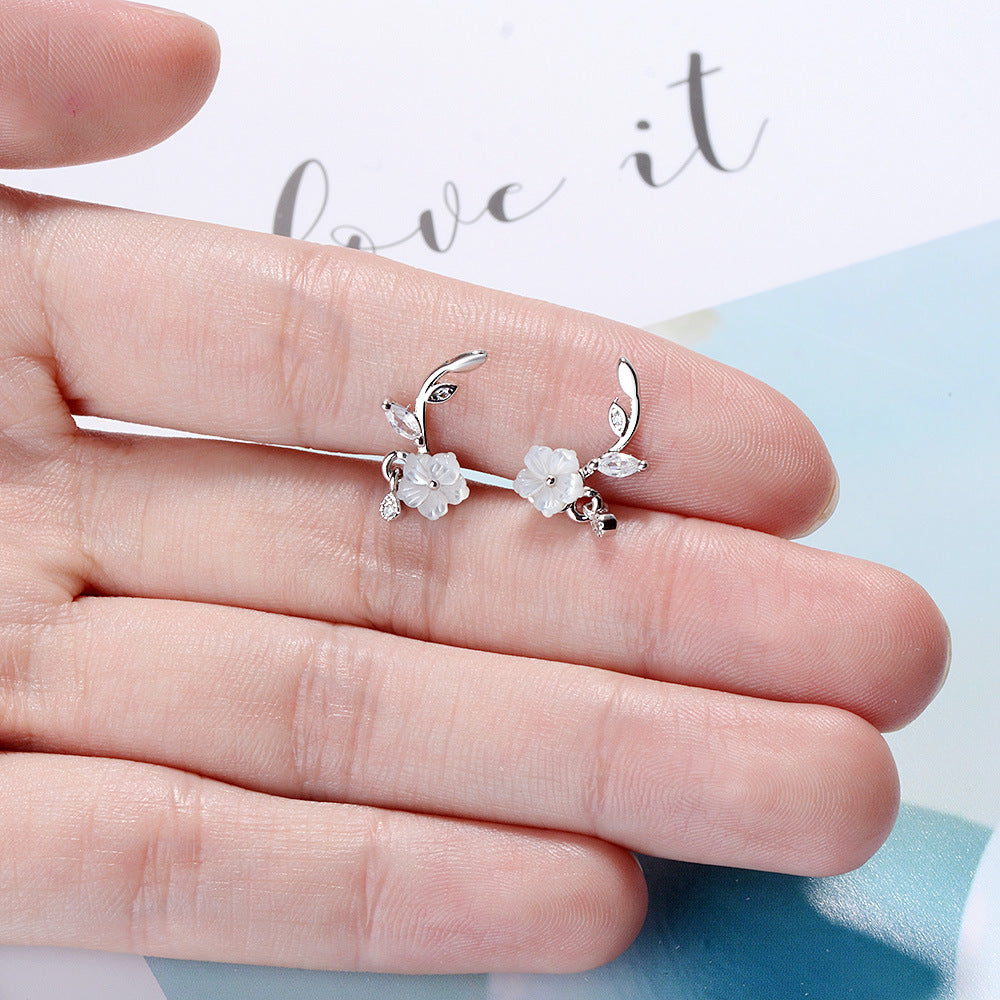 Hand carved flower earrings