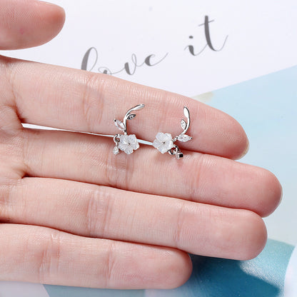 Hand carved flower earrings